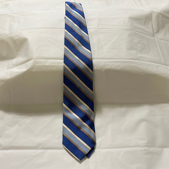 Jos A Bank men’s tie in various blues and metallic gold and tan stripes. NWT - Picture 1 of 4
